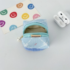 Blue corduroy mini pouch with white quilt pattern and pearl pendant for earbuds