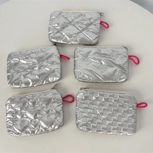 Five assorted silver quilted PU makeup bags with metallic finish and pink lanyards
