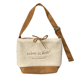 Fleece and faux suede crossbody bag with Crème Glacée embroidery and drawstring
