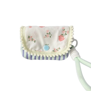 Floral padded storage pouch with stripe pattern and mint green braided wrist strap