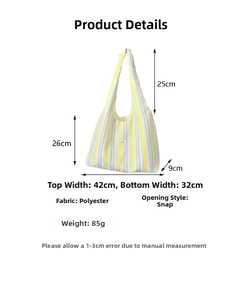 Detailed view of rainbow striped tote bag with dimensions 26x32x9cm and strap length 25cm