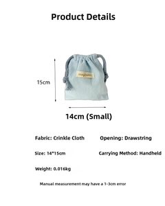 Detail view of light blue crepe fabric storage pouch with 14x15cm size specifications