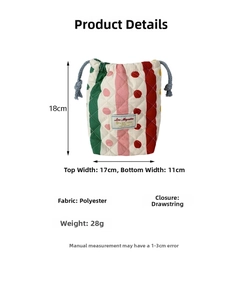 Detailed view of quilted drawstring pouch showing fabric specs and colorful stripe patterns