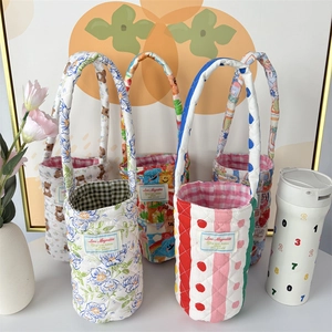 Quilted fabric water bottle bags featuring cute bear and floral prints with handles