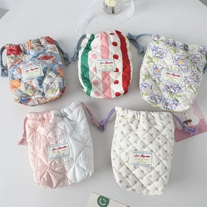Quilted drawstring storage pouch set with floral patterns for Polaroid cameras