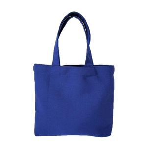 Minimalist deep blue canvas tote bag with sturdy handles for daily work and storage