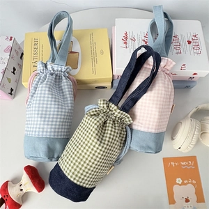 Portable plaid patchwork water bottle sleeve with drawstring and handle in pastel colors