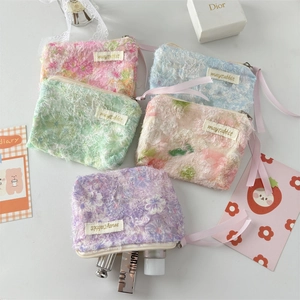 Floral lace storage pouches with zipper and ribbon pullers in five pastel colors