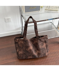 Chic leopard print canvas tote bag displayed in a stylish urban home setting