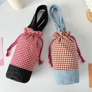 Portable plaid water bottle sleeve with denim patchwork and durable carrying handle