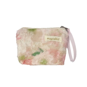 Portable floral lace cosmetic bag with soft plush fabric and a pink wristlet strap
