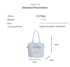 Detailed size chart of a light blue polka dot canvas tote bag with lucky puppy print