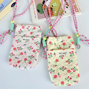 Quilted floral crossbody bag with adjustable braided strap and large capacity