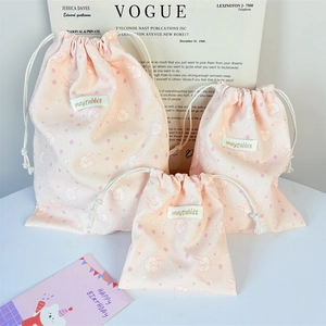 Three-piece pink corduroy drawstring storage bags with cute rabbit print and white cotton ropes
