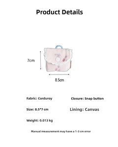 Macro detail of pink floral corduroy pouch showing snap button closure and canvas lining