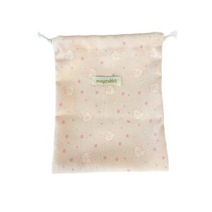 Pink corduroy drawstring bag with cute rabbit print and large storage capacity