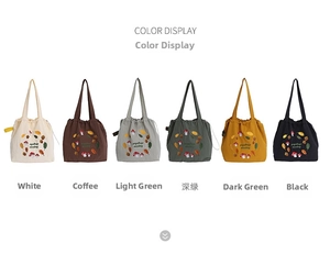 Detailed close-up showing all available colors of mushroom embroidered nylon tote bags