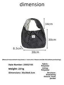 Polka dot tote bag detail showing polyester fabric and ribbon tie closure with dimensions