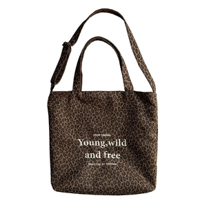 Bolso tote de lona con estampado de leopardo, correa ajustable y texto inspirador