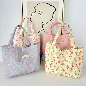 Quilted floral lunch bags with cute bear and rabbit patterns in four pastel colors