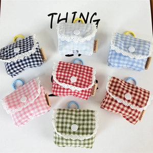 Set of floral plaid earphone pouches with delicate lace trim and hanging hooks