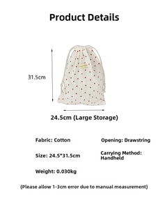 Detailed size chart of the cream cotton drawstring bag with red hearts pattern