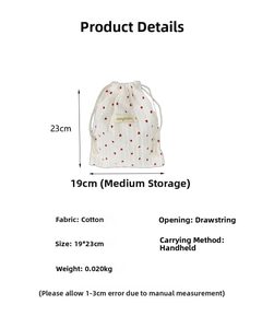 Detailed dimensions of the white cotton drawstring bag with red heart patterns