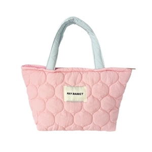 Quilted pastel pink handbag with blue handles and large capacity storage for women