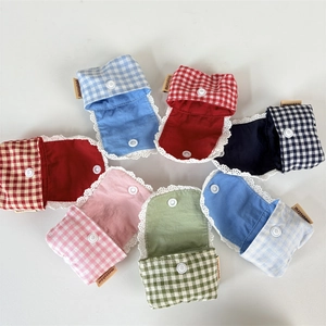 Set of floral plaid earphone pouches with white lace trim and button closure in seven colors