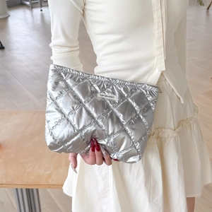 Chic silver quilted PU makeup bag featuring a metallic finish and May Rabbit logo tag