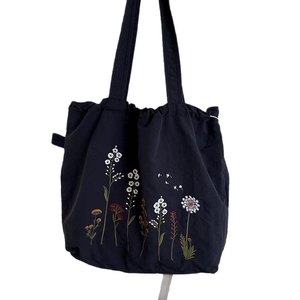 Vintage navy nylon tote bag with floral embroidery and drawstring closure for women