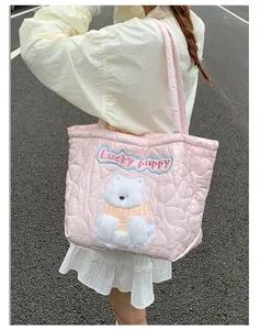 Pink quilted heart tote bag with plush puppy embroidery and Lucky puppy text design