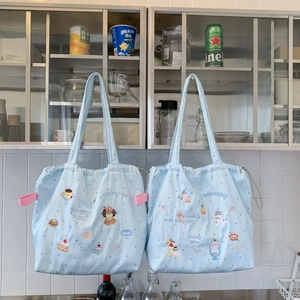 Light blue polka dot drawstring tote bag with cute cartoon embroidery and pink handles