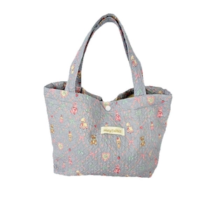 Quilted floral lunch bag with bear and rabbit prints in light blue-gray colorway