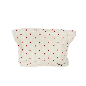 Off-white ribbed makeup bag with red hearts and zipper for cosmetic storage