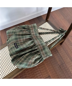 Détail du grand sac cabas à carreaux vert avec tissu plissé et étiquette Romance