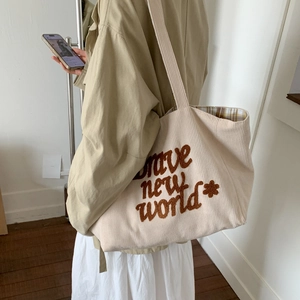 Minimalist cream corduroy tote bag with brave new world embroidery and large capacity