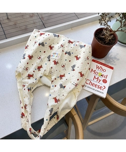 Detail of seersucker tote bag with cartoon dog prints and creme glacee label