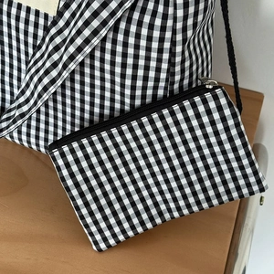 Large Vichy checkerboard canvas tote bag and matching pouch on a wooden table