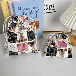 Set of two checkered bear canvas drawstring bags for travel and home organization