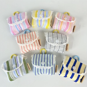 Striped earphone pouch with lace trim and plastic hook in colorful fabric options