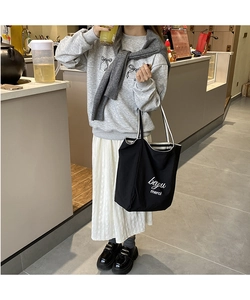 Sac fourre-tout en toile noire avec bandoulières rayées et imprimé merci élégant