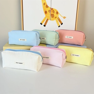 Pastel waffle fabric large pencil cases in six assorted colors with woven logo labels