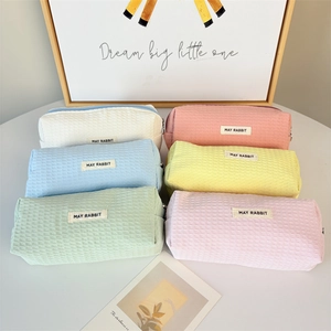 Large capacity waffle texture pencil cases in six pastel colors with zipper closure