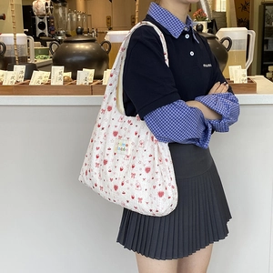 Spacious white canvas tote bag with red heart patterns and cute cartoon prints