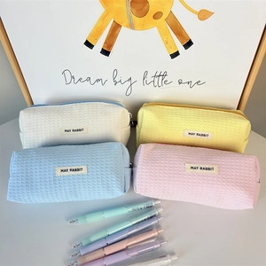 Large waffle texture pencil cases in pastel colors for stationery and makeup storage
