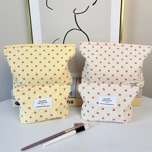 Cute floral cosmetic bag set with bubble texture in cream and yellow colors