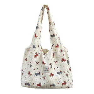 Cream quilted canvas tote bag with puppy prints and large capacity for daily shopping