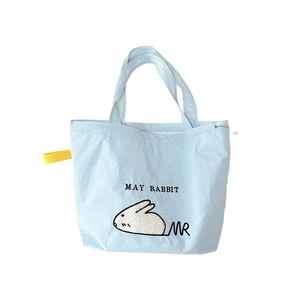 Light blue canvas tote bag featuring cute rabbit embroidery and yellow decorative strap