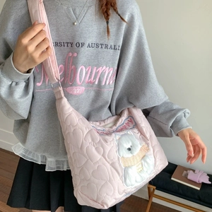 Pink quilted tote bag with cute bear embroidery and wide shoulder strap for women